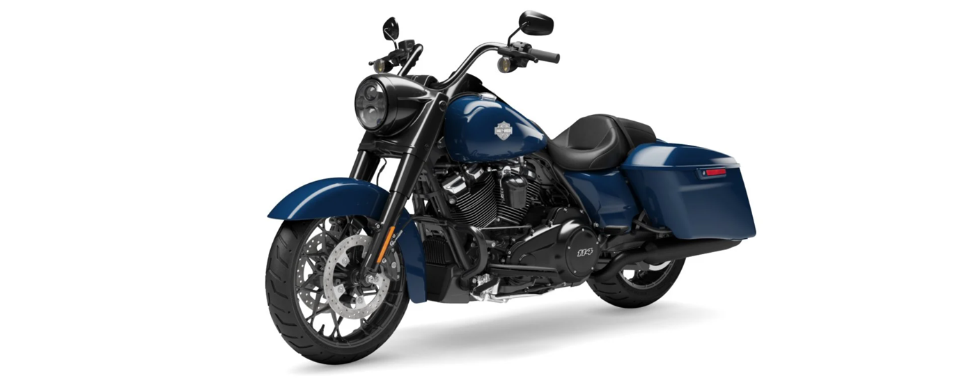 A blue 2022 Harley-Davidson Road King Special is angled left.