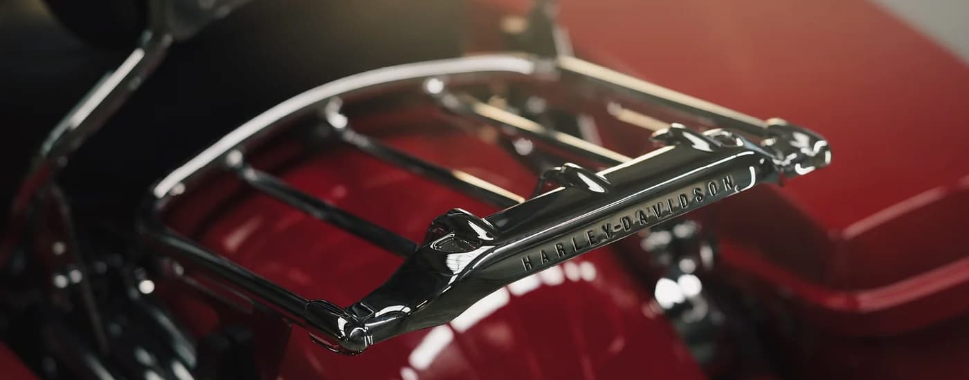 A close up of storage rack on a red 2023 Harley-Davidson Road Glide is shown.