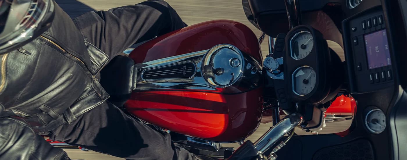 A close up of the center of a red 2023 Harley-Davidson Road Glide is shown.